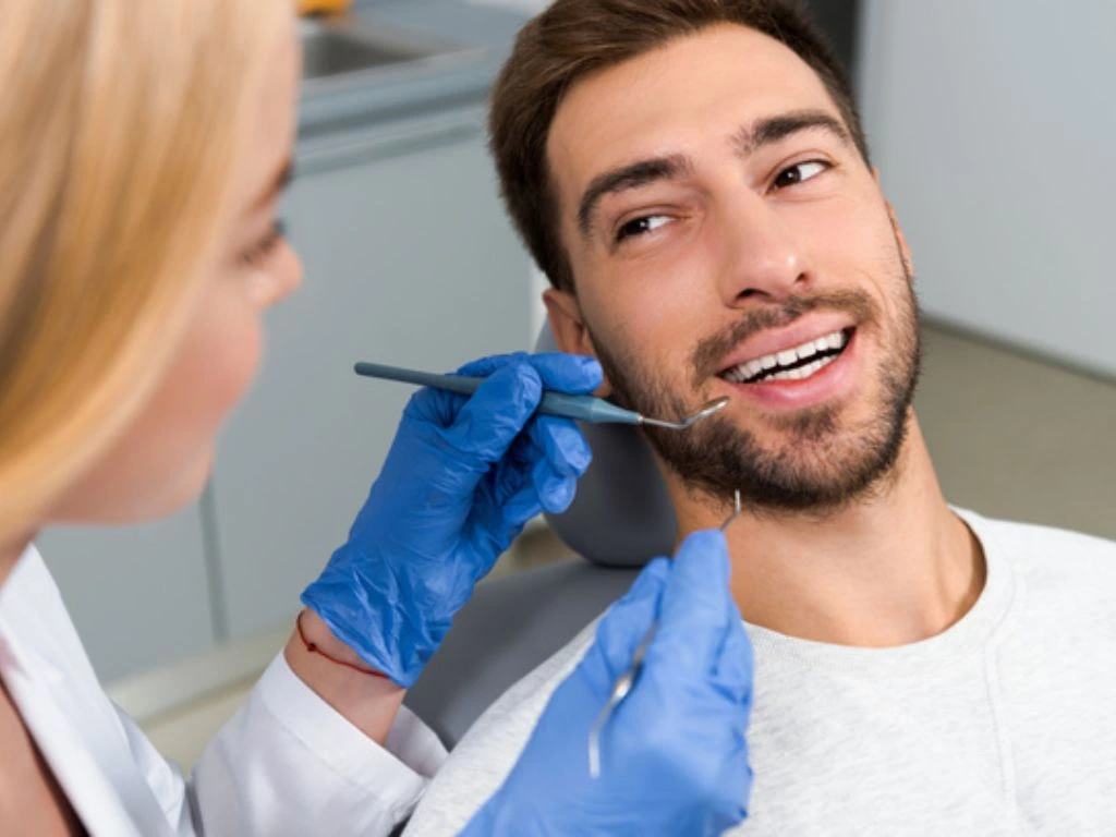 A patient undergoing a dental check up showcasing the personalized approach to preventive and cosmetic dentistry